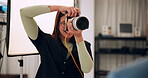 Photographer, camera and photoshoot in studio for 
project, media and magazine cover as creative. Cameraman, focus and female person backstage for shooting, production and brand as director with lens