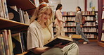 Student, girl and reading on floor in library for literature research or studying for knowledge. Gen z person, novel or search for academic information in book for scholarship, education and learning