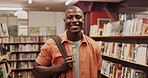 Student, black man and face or happy in library for studying, literature research or learning for knowledge. Gen z, portrait and smile for education with backpack, scholarship or academic information