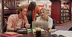 Happy, students and study group with laptop, books and paperwork for education discussion in library. Thinking, friends or people learning together with computer, communication and exam preparation