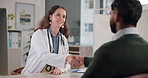 Doctor, woman and handshake with patient in office for healthcare consultation, checkup and advice. Medical worker shaking hands with client for introduction, greeting and talking of test or services