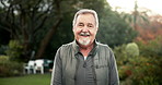 Senior man, face and smile at park on morning walk for health, wellness or fresh air on grass at sunrise. Elderly person, portrait and happy for start, retirement or outdoor for winter in Washington