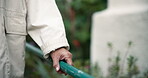 Balance, hand and railing with senior person walking outdoor in garden of retirement home closeup. Stability, sturdy and support with elderly resident in backyard for activity, fresh air or wellness