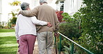 Back view, senior couple and walk in backyard for love, retirement and hug for date together. Smile, elderly man and woman in garden of nursing home for support in nature for anniversary and wellness