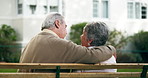 Senior couple, back view and sitting in garden for relax, love and support for retirement. Calm, elderly man and woman in backyard of nursing home for care, pride and wellness for relationship 