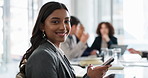 Face of business woman, meeting and phone in boardroom of office for communication or networking. Corporate, planning and smile with portrait of happy employee in workplace for training or workshop