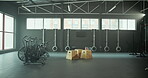 Empty, equipment and machine in gym for workout, exercise and fitness for wellness in health club. Training center, gear and elliptical for weightloss, competition preparation and bodybuilding