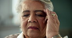 Senior woman, stress and pain with headache in anxiety, depression or mental health at home. Closeup of elderly female person with migraine, ache or touching temple in fatigue or frustration at house