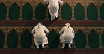 People, praying and prostration in mosque for religion, top view and worship in temple for gratitude. Men, above and community in salah for spiritual praise, faith and muslim in sujood for Allah