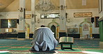 Muslim, man and prayer or dua in mosque for religious worship, spiritual faith or gratitude in praise. Back, islamic person or kneeling in holy temple and praying to Allah for Palestine in solidarity