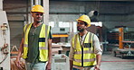 Industrial, engineering and teamwork of people in warehouse with wood, lumber or material production. Man and supervisor walking in factory for inspection, manufacturing and talking of workflow ideas