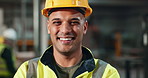 Helmet, worker and portrait of man in construction, safety and industry of engineering, warehouse and building. Industrial, happy and face of person, smile and joy of employee in factory for storage