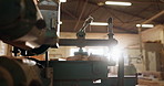 Wood, workshop and carpentry with tools, machinery and construction with startup, lens flare and business. Engineering, empty and equipment for service, warehouse and industrial with manufacturing