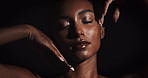 Woman, sexy and glow for skincare with beauty makeup, natural shine and erotic confidence in dark studio. Girl, model and dermatology with body skin shimmer, sexuality and sensual by black background