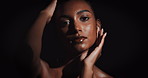 Woman, sensual and glow for skincare portrait with beauty, natural shine and sexy confidence in dark studio. Girl, dermatology and body with skin shimmer, sexuality and movement by black background