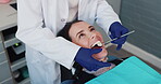 Dentist, woman and mirror in mouth for consultation, patient examination and oral inspection for routine checkup. Girl, dental tool and assessment for cleaning, procedure and teeth whitening or care.