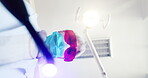 Pov, dentist and light for dental care in clinic, healthcare or operating room for treatment. Root canal, curing and cleaning for teeth whitening for patient, toothache and service for medical help