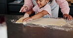 Girl, woman and baking in kitchen in home, bonding and teaching culinary skills with family in house. Happy, education and preparing flour on table, excited and child development in apartment 