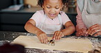 Grandmother, girl and baking with cookie cutter for dessert, food and family in kitchen with recipe. Snack, teaching and childhood development for young person, granny and cooking with ingredients