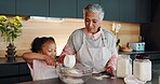 Child, grandmother and baking or teaching in house, bonding and helping for culinary skills in family kitchen. Happy, education and cookies ingredients on table, sifting flour and girl development