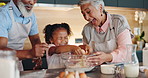 Cooking, grandparents and girl with egg at kitchen counter for development, learning and ingredients. Baking, diversity and people with kid for cookie recipe, teaching or mixing flour on weekend