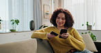 Woman, phone and credit card on couch for payment in living room for ecommerce with fintech app for deal. Person, online shopping and smartphone with sale from targeted advertising on social media