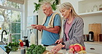 Fruits, smoothie and mature couple with healthy food, vegetables and prepare drink for detox in kitchen. People eating and cooking with organic ingredients for nutrition and recipe in blender at home