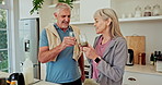 Senior couple, smoothie and happy in kitchen with toast for workout, wellness and supplements in home. People, woman and man with protein, milkshake and cheers for achievement with fitness in house