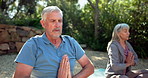 Senior couple, yoga and namaste at park with breathing, zen and mindfulness with connection in summer. Retirement, woman and man with mat on lawn in morning meditation with prayer hands in sunshine