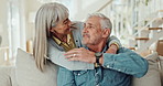 Mature couple, hug and love on sofa with happy marriage, support and talking of pension or security at home. Man and woman embrace on couch for commitment, health and wellness or trust and affection