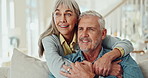 Mature couple, hug and watching tv on sofa with happy marriage, support and talking of pension at home. Man and woman smile on couch for comfort film, movie or show with memory, bonding and break