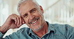 Senior man, face and smile in home to relax in living room with confidence, pride and style in retirement. Person, happy and pensioner in modern house for portrait to start morning in New Zealand