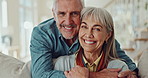 Face, hug and senior couple laugh on sofa with love, trust and bonding their home together. Comic, portrait and funny old people in living room with security, support and gratitude in retirement
