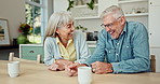 Laughing, conversation and mature couple in kitchen with coffee on weekend morning for bonding. Happy, funny and senior man and woman talking with comedy and drinking cappuccino together at home.