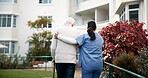 Back, nurse and walking stick with senior patient for help, support and trust with care in garden. People, woman and pensioner with caregiver in healthcare, rehabilitation and exercise on retirement
