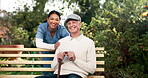 People, nurse and senior patient in bench on portrait for help, support and happy with care in garden. Woman, man and smile with caregiver in healthcare, rehabilitation and pensioner at nursing home