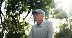 Thinking, relax and senior man in garden of nursing home for retirement and wellness. Smile, elderly male person and gratitude for health, calm and care or comfort in nature or backyard in morning
