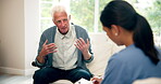 Consultation, senior man and caregiver for support, security and mental wellbeing with talking in clinic. Elderly care, old man and female nurse for checklist, companion and wellness in retirement