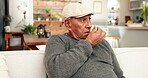 Senior man, glasses and tired in home on sofa with eyes pain, headache and brain fog for retirement. Elderly person, prescription and fatigue in living room on couch with migraine, stress and vertigo