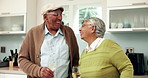 Happy, senior couple and wine with talking in house for connection, laugh and memory as partner. Elderly people, drinking and kitchen for bonding, relationship or together in home for support or love