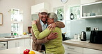 Happy, senior couple and dancing with hug in house for connection, celebration or memory as partner. Elderly people, fun and kitchen for bonding, relationship and together in home for support or love