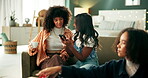 Woman, friends and talking on sofa with smartphone, sharing and advice for online dating on mobile app. Conversation, social media and internet gossip for bonding, apartment and people get together