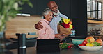 Flowers, hug or senior couple with present on Valentines day or marriage anniversary with love ion home. Bouquet, interracial relationship or people with support, surprise gift or care for commitment