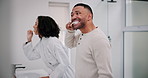 Dental, brushing teeth and couple in bathroom for wellness, oral hygiene or morning routine.Toothbrush, cleaning and happy man with woman for fresh breath, healthy mouth or self care in home