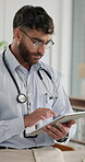 Man, doctor and tablet in hospital for healthcare research, reading review and history report of diagnosis treatment. Medic, digital and Telehealth of schedule, information and insurance medicine 