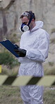 Man, scientist and checklist for safety of gas outdoor with chemical danger, toxic fumes or illegal drug production. Person, hazmat suit and investigation caution, biohazard or clandestine protection