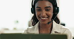 Woman, headset and computer in office for contact, consultation and communication online. Female agent, virtual assistant and technology with smile for advice, feedback and tech support or help