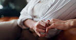 Divorce, hands and woman with wedding ring on a sofa frustrated by jealous, liar or cheating partner at home. Marriage, fail and people in living room with argue stress, dispute or fighting crisis