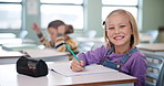 Portrait, girl and classroom for education at school with learning, knowledge and happy for academic development. Student, smile and aper for drawing lesson, assessment and creative for future