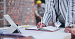 Writing, hands and notebook on construction site for plan, checklist and schedule for project management. Person, journal and brainstorming on worksite for inspection, safety compliance and reminder